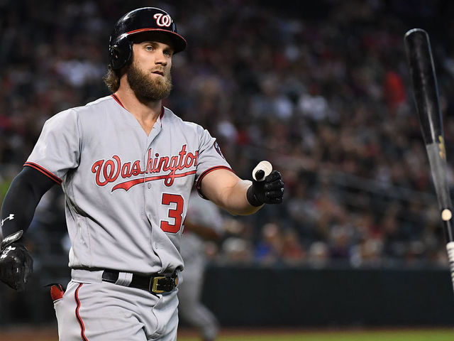 PHOENIX, AZ - JULY 23: Bryce Harper #34 of the Washington Nationals throws his bat after lining out to center field against the Arizona Diamondbacks during the ninth inning at Chase Field on July 23, 2017 in Phoenix, Arizona. Nationals won 6-2.