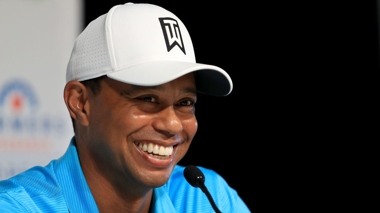 SAN DIEGO, CA - JANUARY 24: Tiger Woods laughs during a press conference after playing in the pro-am round of the Farmers Insurance Open at Torrey Pines Golf Course on January 24, 2018 in San Diego, California.