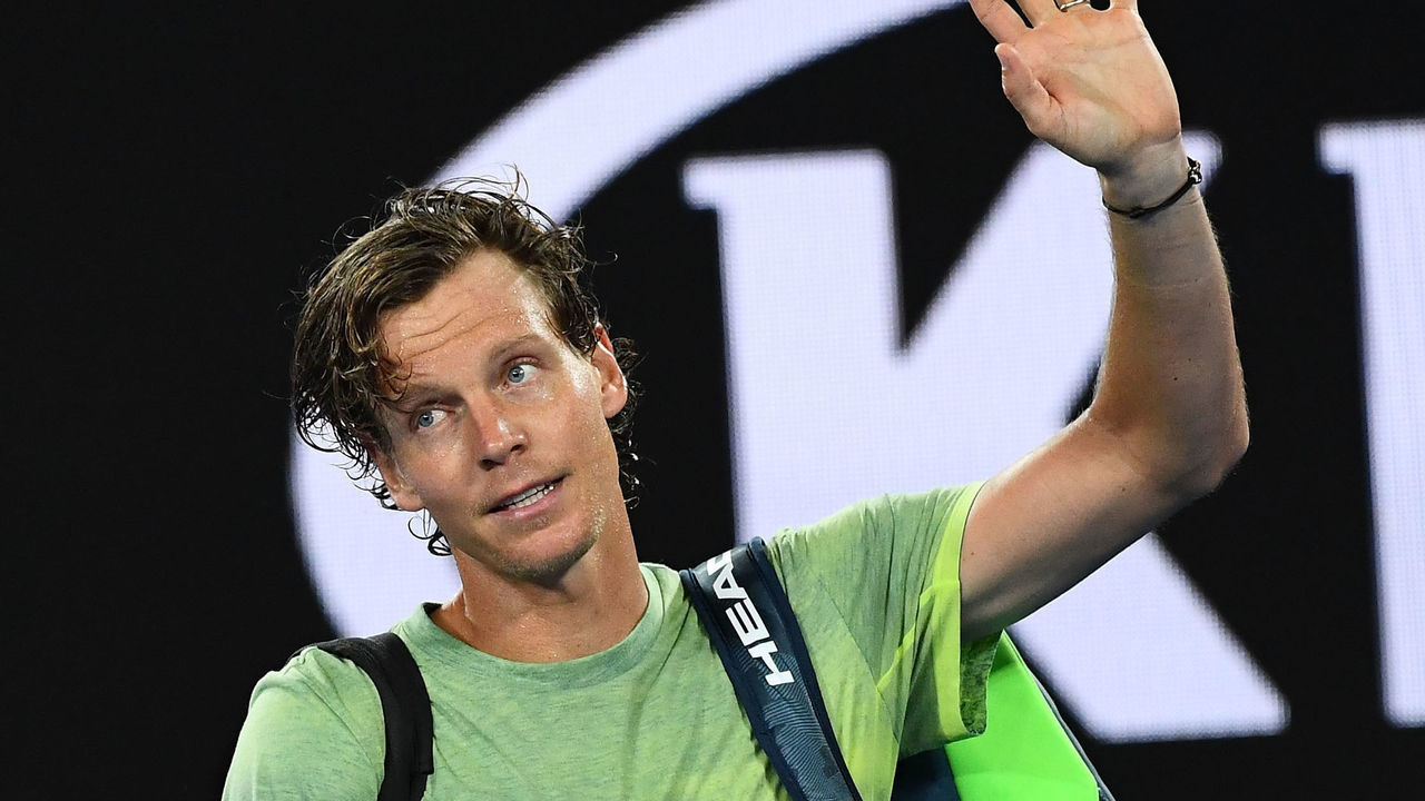 MELBOURNE, AUSTRALIA - JANUARY 24: Tomas Berdych of the Czech Republic waves to the crowd as he walks off the court after losing his quarter-final match to Roger Federer of Switzerland n day 10 of the 2018 Australian Open at Melbourne Park on January 24, 2018 in Melbourne, Australia.