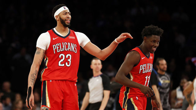 Holiday officially gives Pelicans a Big 3