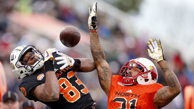 MOBILE, AL - JANUARY 28: Brendan Langley #31 of the North team breaks up a pass intended for Travin Dural #83 of the South team during the first half of the Reese's Senior Bowl at the Ladd-Peebles Stadium on January 28, 2017 in Mobile, Alabama.