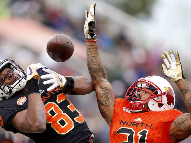 MOBILE, AL - JANUARY 28: Brendan Langley #31 of the North team breaks up a pass intended for Travin Dural #83 of the South team during the first half of the Reese's Senior Bowl at the Ladd-Peebles Stadium on January 28, 2017 in Mobile, Alabama.