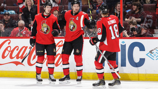 OTTAWA, ON - JANUARY 9: Mark Stone #61 of the Ottawa Senators celebrates his second period goal against the Chicago Blackhawks with teammates Thomas Chabot #72 and Ryan Dzingel #18 at Canadian Tire Centre on January 9, 2018 in Ottawa, Ontario, Canada.