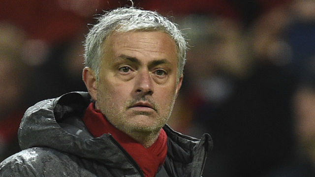 Manchester United's Portuguese manager Jose Mourinho leaves the pitch at the end of the English Premier League football match between Manchester United and Stoke City at Old Trafford in Manchester, north west England, on January 15, 2018. / AFP PHOTO / Oli SCARFF /