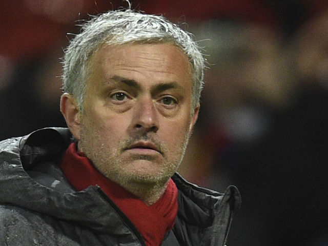 Manchester United's Portuguese manager Jose Mourinho leaves the pitch at the end of the English Premier League football match between Manchester United and Stoke City at Old Trafford in Manchester, north west England, on January 15, 2018. / AFP PHOTO / Oli SCARFF /