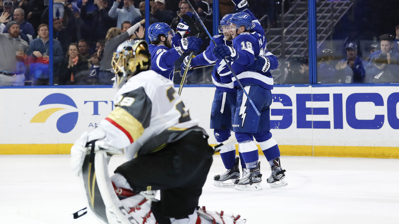 TAMPA, FL - JANUARY 18: Tampa Bay Lightning left wing Ondrej Palat (18) celebrates with Tampa Bay Lightning center Steven Stamkos (91) and Tampa Bay Lightning right wing Nikita Kucherov (86) after scoring a goal on Vegas Golden Knights goaltender Marc-Andre Fleury (29) in the second period of the NHL game between the Vegas Golden Knights and Tampa Bay Lightning on January 18, 2018 at Amalie Arena in Tampa, FL.