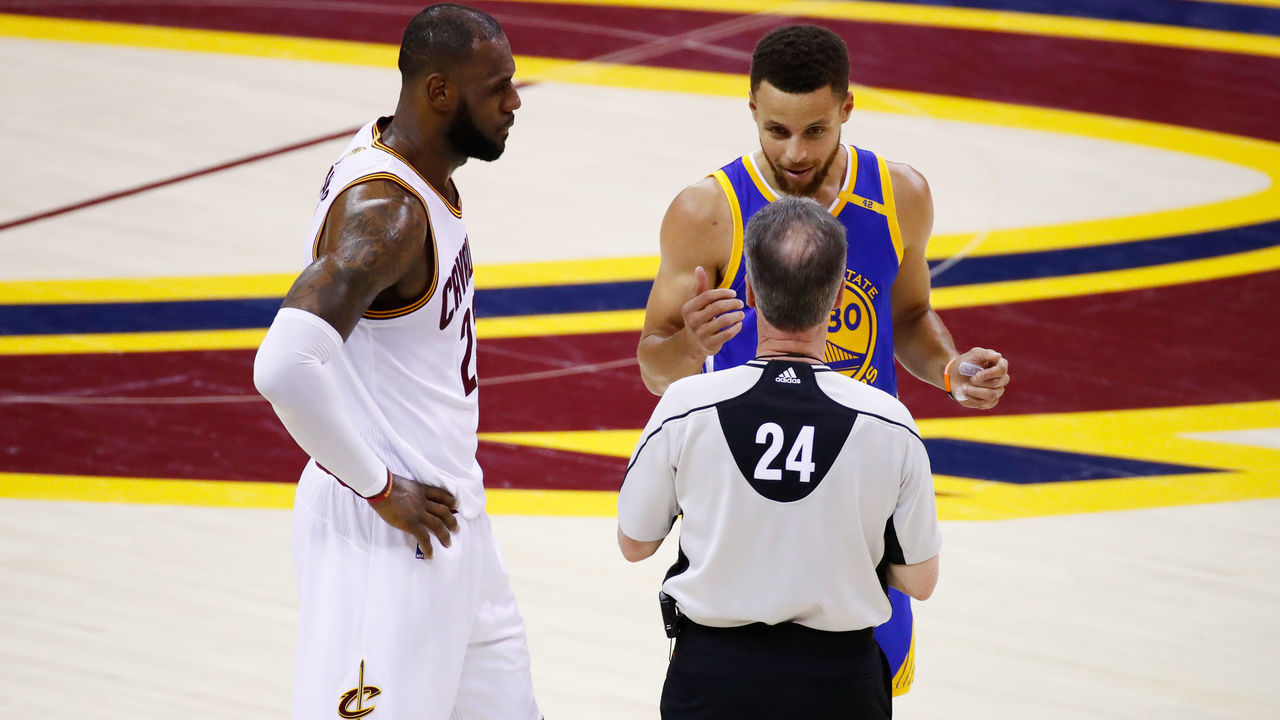 CLEVELAND, OH - JUNE 09: LeBron James #23 of the Cleveland Cavaliers and Stephen Curry #30 of the Golden State Warriors discuss the call with referee Mike Callahan #24 during the first half in Game 4 of the 2017 NBA Finals at Quicken Loans Arena on June 9, 2017 in Cleveland, Ohio.