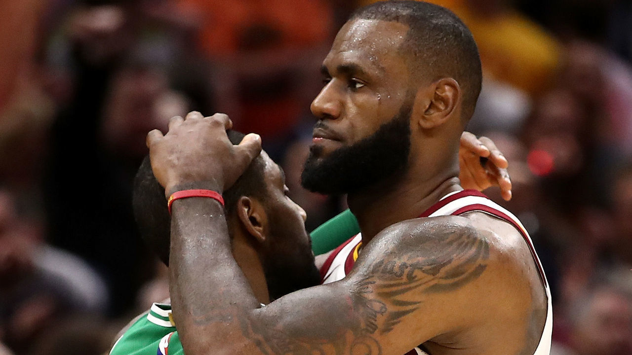 CLEVELAND, OH - OCTOBER 17: LeBron James #23 of the Cleveland Cavaliers and Kyrie Irving #11 of the Boston Celtics embrace after a Cavaliers 102-99 victory at Quicken Loans Arena on October 17, 2017 in Cleveland, Ohio.
