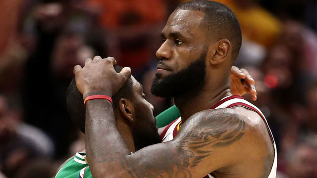 CLEVELAND, OH - OCTOBER 17: LeBron James #23 of the Cleveland Cavaliers and Kyrie Irving #11 of the Boston Celtics embrace after a Cavaliers 102-99 victory at Quicken Loans Arena on October 17, 2017 in Cleveland, Ohio.