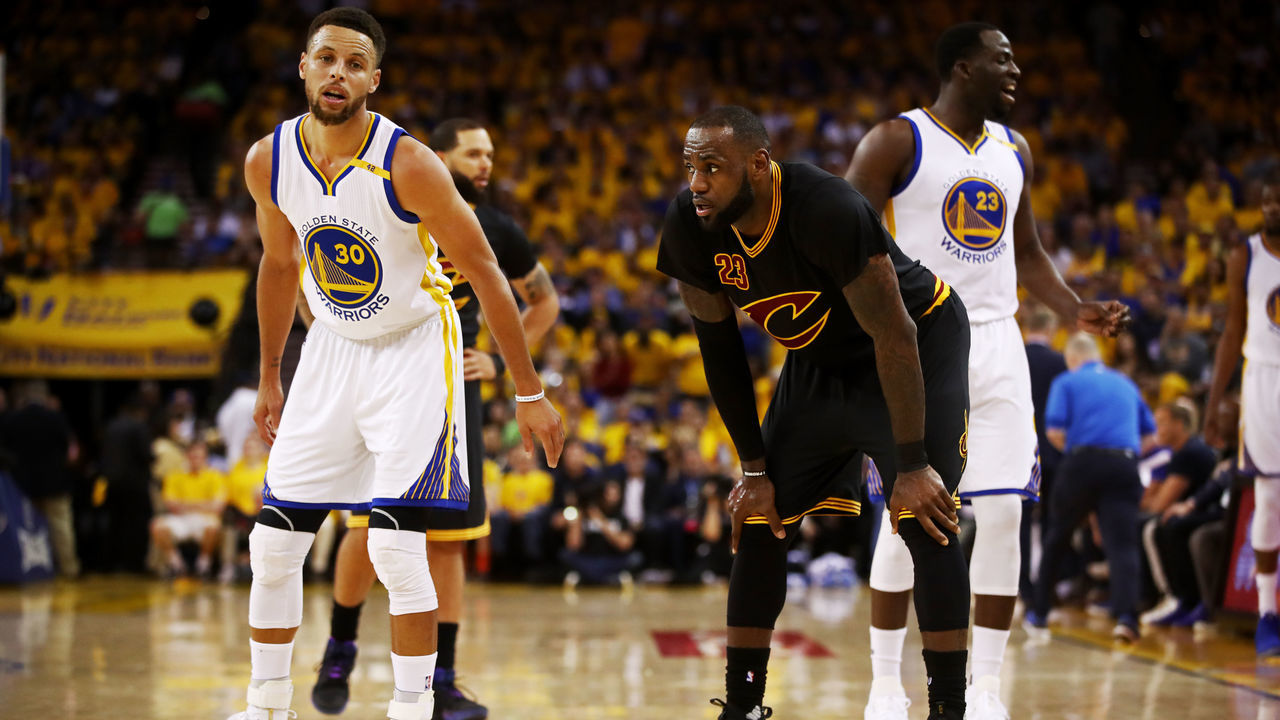 OAKLAND, CA - JUNE 04: Stephen Curry #30 and LeBron James #23 of the Cleveland Cavaliers look on during the first half in Game 2 of the 2017 NBA Finals at ORACLE Arena on June 4, 2017 in Oakland, California.