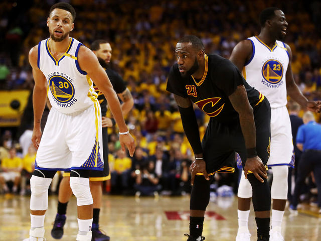 OAKLAND, CA - JUNE 04: Stephen Curry #30 and LeBron James #23 of the Cleveland Cavaliers look on during the first half in Game 2 of the 2017 NBA Finals at ORACLE Arena on June 4, 2017 in Oakland, California.