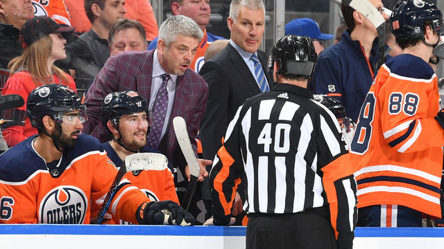 EDMONTON, AB - JANUARY 25: Todd McLellan of the Edmonton Oilers exchanges words with an official during the game against the Calgary Flames on January 25, 2017 at Rogers Place in Edmonton, Alberta, Canada.