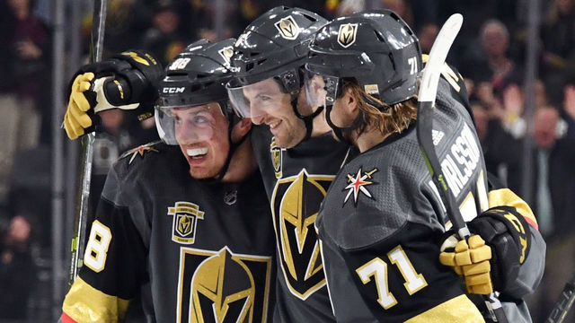 LAS VEGAS, NV - JANUARY 23: Colin Miller (C) #6 of the Vegas Golden Knights is congratulated by teammates Nate Schmidt #88 and William Karlsson #71 after Miller scored a second-period goal against the Columbus Blue Jackets during their game at T-Mobile Arena on January 23, 2018 in Las Vegas, Nevada.
