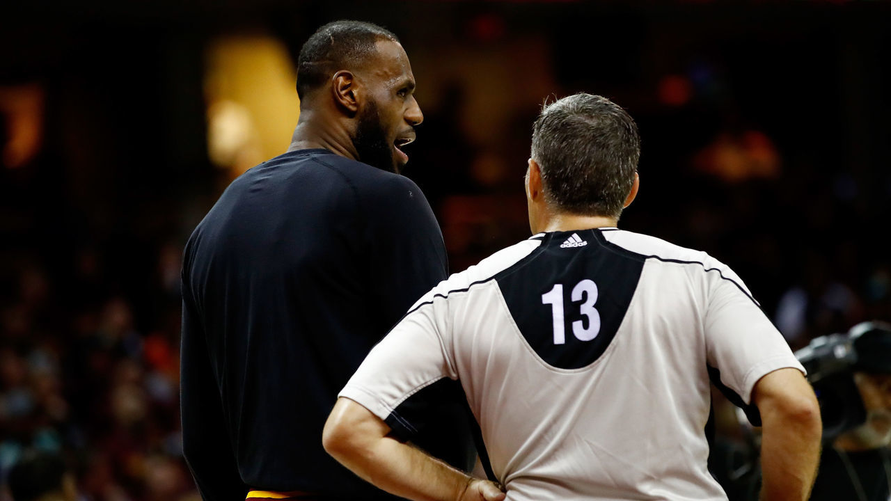 CLEVELAND, OH - MAY 23: LeBron James #23 of the Cleveland Cavaliers talks to referee Monty McCutchen #13 in the first half against the Boston Celtics during Game Four of the 2017 NBA Eastern Conference Finals at Quicken Loans Arena on May 23, 2017 in Cleveland, Ohio.