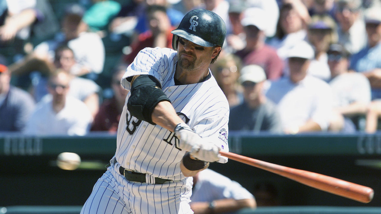 DENVER - APRIL 26: Right fielder Larry Walker #33 of the Colorado Rockies swings at the pitch during the MLB game against the Chicago Cubs on April 26, 2001 at Coors Field in Denver, Colorado. The Cubs won 7-2.
