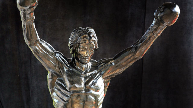 A statue of the film character Rocky Balboa is seen in the village of Zitiste, 19 August 2007. The three-meter high statue of Stallone in the role of Rocky, made by a Croatian sculptor, was revealed late Saturday in the center of the northern Serbian village of Zitiste, some 55 kilometers (33 miles) north from the capital Belgrade. The idea to build a statue emerged in February to a village inhabitant who said he wanted to pay tribute to his favorite hero after seeing the sixth and latest 'Rocky' movie. AFP PHOTO / DIMITAR DILKOFF