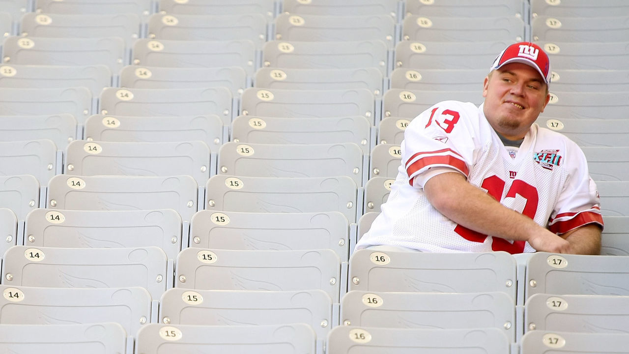 GLENDALE, AZ - JANUARY 29: Quarterback Jared Lorenzen #13 of the New York Giants sits in the stands during Giants media day for Super Bowl XLII at University of Phoenix Stadium on January 29, 2008 in Glendale, Arizona.