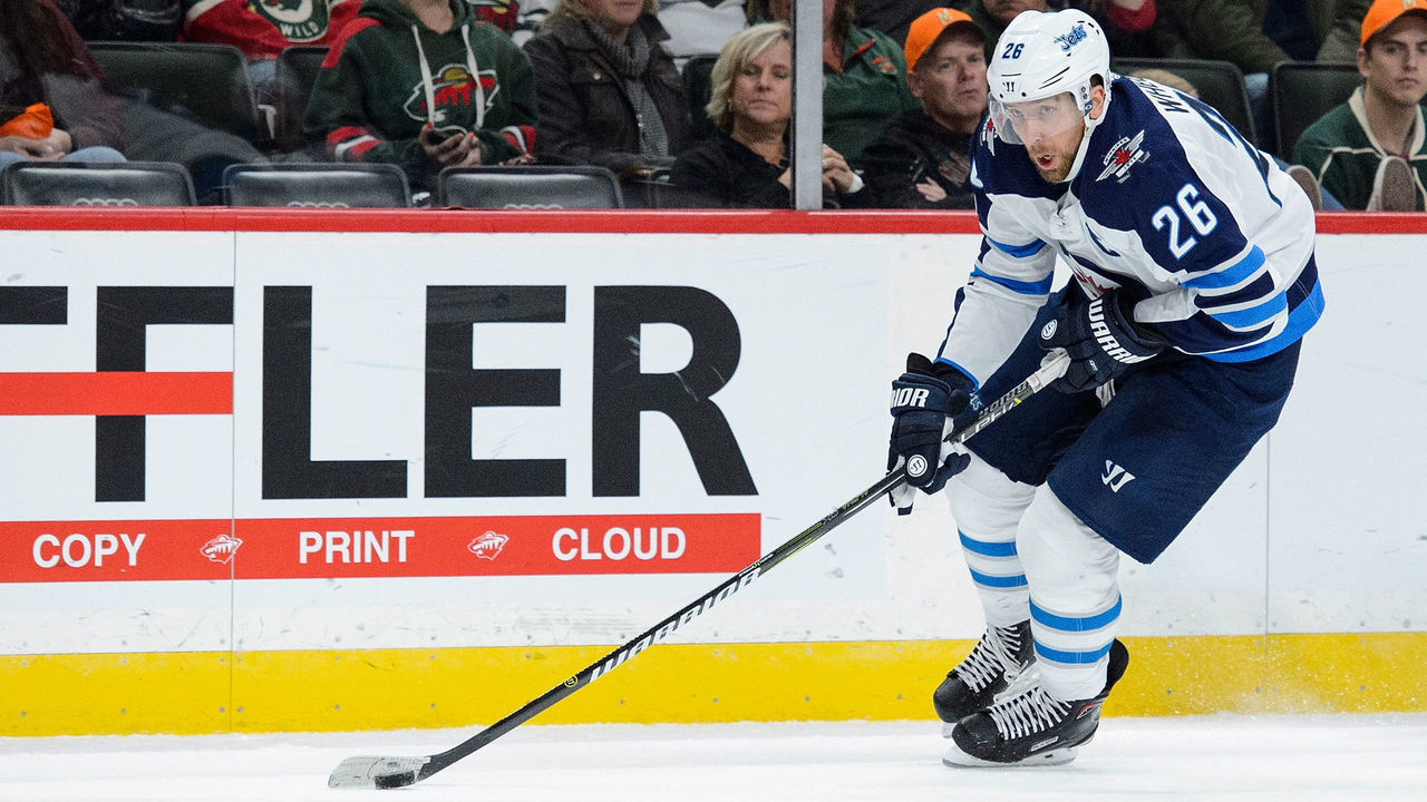 ST PAUL, MN - OCTOBER 31: Blake Wheeler #26 of the Winnipeg Jets controls the puck against the Minnesota Wild during the game on October 31, 2017 at Xcel Energy Center in St Paul, Minnesota. The Jets defeated the Wild 2-1.
