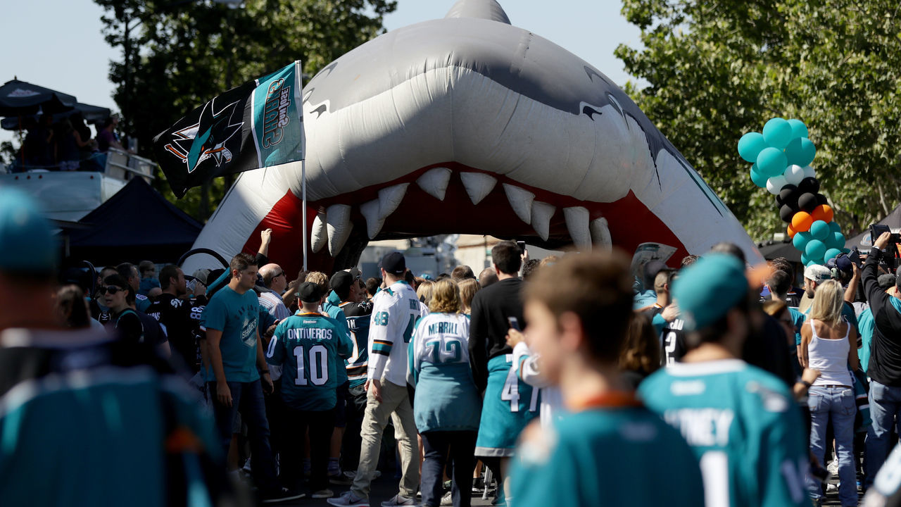 SAN JOSE, CA - JUNE 06: San Jose Sharks fans walk through a blow up shark head outside of the arena prior to Game Four of the 2016 NHL Stanley Cup Final between the San Jose Sharks and the Pittsburgh Penguins at SAP Center on June 6, 2016 in San Jose, California.