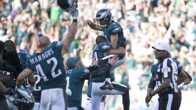 PHILADELPHIA, PA - SEPTEMBER 24: Jake Elliott #4 of the Philadelphia Eagles celebrates with Kamu Grugier-Hill #54, Carson Wentz #11, and Chris Maragos #42 after kicking the game winning field as time expired against the New York Giants at Lincoln Financial Field on September 24, 2017 in Philadelphia, Pennsylvania. The Eagles defeated the Giants 27-24.