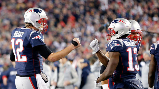 FOXBOROUGH, MA - JANUARY 21: Tom Brady #12 of the New England Patriots reacts with Phillip Dorsett #13 in the second half during the AFC Championship Game against the Jacksonville Jaguars at Gillette Stadium on January 21, 2018 in Foxborough, Massachusetts.