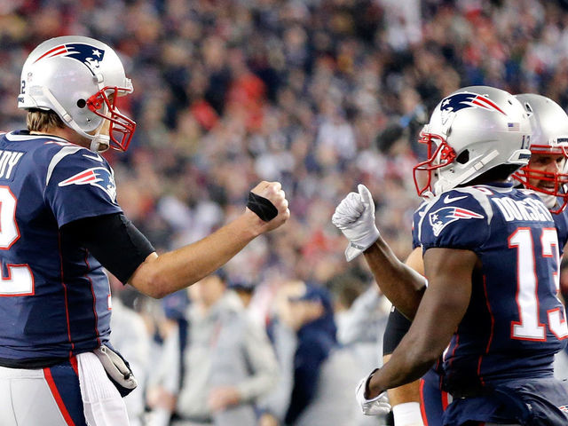 FOXBOROUGH, MA - JANUARY 21: Tom Brady #12 of the New England Patriots reacts with Phillip Dorsett #13 in the second half during the AFC Championship Game against the Jacksonville Jaguars at Gillette Stadium on January 21, 2018 in Foxborough, Massachusetts.