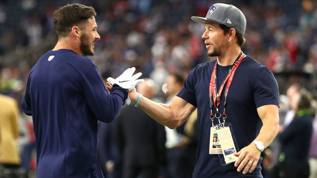 HOUSTON, TX - FEBRUARY 05: Danny Amendola #80 of the New England Patriots speaks to actor Mark Wahlberg prior to Super Bowl 51 against the Atlanta Falcons at NRG Stadium on February 5, 2017 in Houston, Texas.