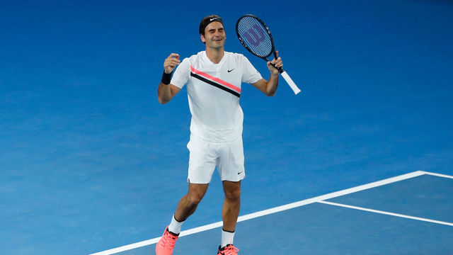 MELBOURNE, AUSTRALIA - JANUARY 28: Roger Federer of Switzerland celebrates winning championship point in his men's singles final match against Marin Cilic of Croatia on day 14 of the 2018 Australian Open at Melbourne Park on January 28, 2018 in Melbourne, Australia.