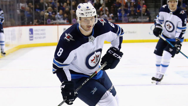 NEW YORK, NY - DECEMBER 23: Jacob Trouba #8 of the Winnipeg Jets skates against the New York Islanders at the Barclays Center on December 23, 2017 in the Brooklyn borough of New York City. The Islanders defeated the Jets 5-2.