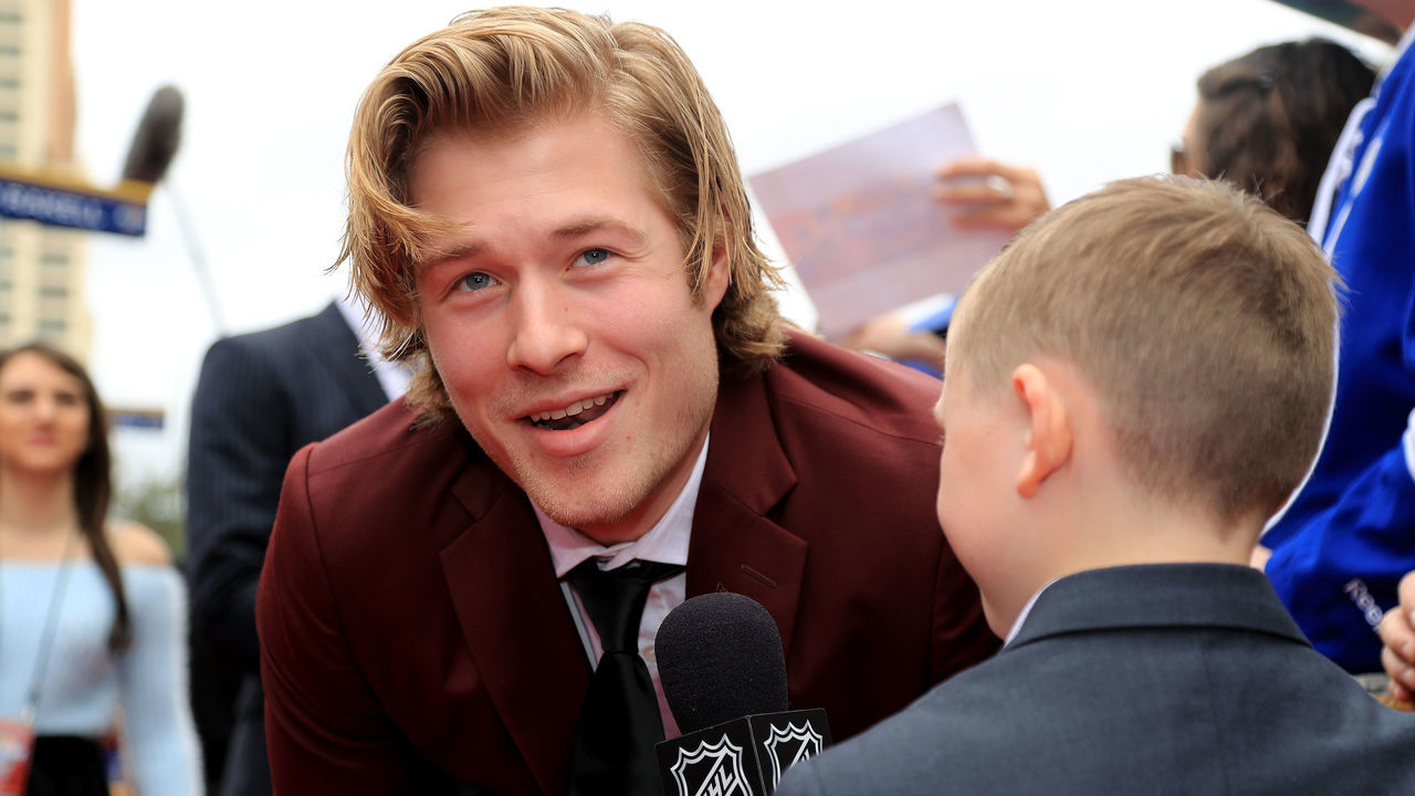 TAMPA, FL - JANUARY 28: Brock Boeser #6 of the Vancouver Canucks gets interviewed after arriving on the red carpet prior to the 2018 Honda NHL All-Star Game at Amalie Arena on January 28, 2018 in Tampa, Florida.