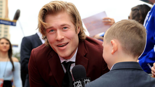 TAMPA, FL - JANUARY 28: Brock Boeser #6 of the Vancouver Canucks gets interviewed after arriving on the red carpet prior to the 2018 Honda NHL All-Star Game at Amalie Arena on January 28, 2018 in Tampa, Florida.