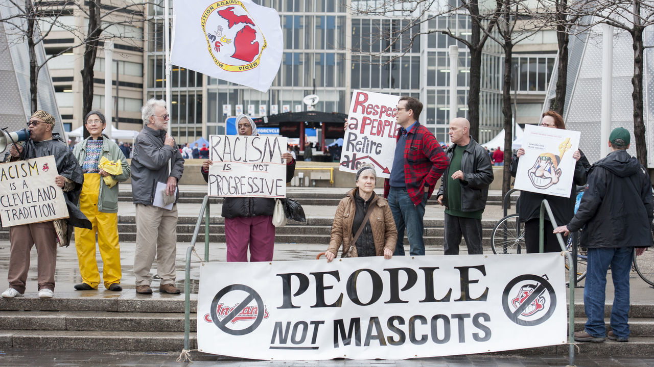 CLEVELAND, OH - APRIL 4: Protestors voice their opinion about Cleveland Indians mascot Chief Wahoo outside Progressive Field prior to the game between the Cleveland Indians and the Minnesota Twins on April 4, 2014 in Cleveland, Ohio.