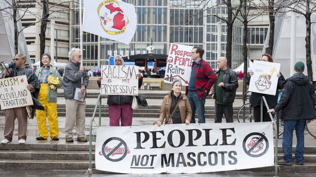 CLEVELAND, OH - APRIL 4: Protestors voice their opinion about Cleveland Indians mascot Chief Wahoo outside Progressive Field prior to the game between the Cleveland Indians and the Minnesota Twins on April 4, 2014 in Cleveland, Ohio.