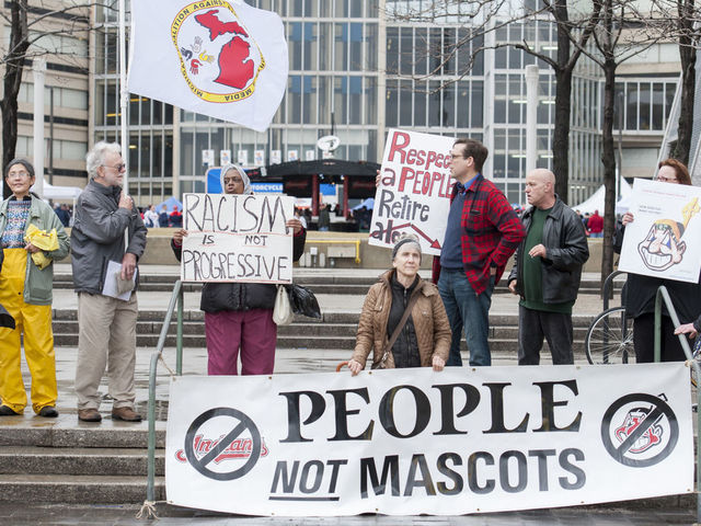 CLEVELAND, OH - APRIL 4: Protestors voice their opinion about Cleveland Indians mascot Chief Wahoo outside Progressive Field prior to the game between the Cleveland Indians and the Minnesota Twins on April 4, 2014 in Cleveland, Ohio.