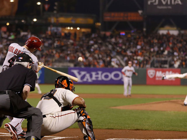 SAN FRANCISCO, CA - SEPTEMBER 25: Paul Goldschmidt #44 of the Arizona Diamondbacks hits a sacrifice fly off of Tim Lincecum #55 of the San Francisco Giants that scored Adam Eaton #6 in the first inning at AT&T Park on September 25, 2012 in San Francisco, California.