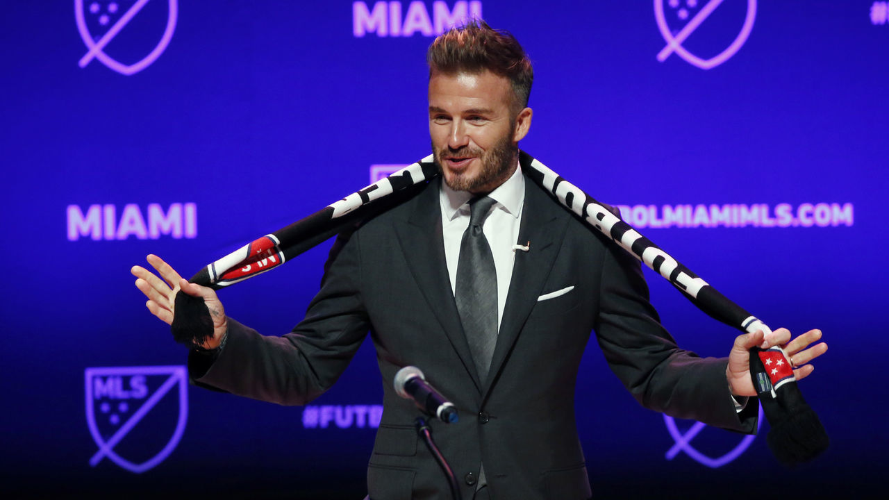 Former soccer player David Beckham addresses the media during an event to announce his Major League Soccer franchise in Miami, Florida on January 29, 2018. English football superstar David Beckham was officially awarded a Major League Soccer franchise in Miami, but there was no immediate word on when the long-awaited team will kick off. The Miami expansion team is widely expected to join the league in 2020 but there was no official word on a start date on Monday. / AFP PHOTO / RHONA WISE