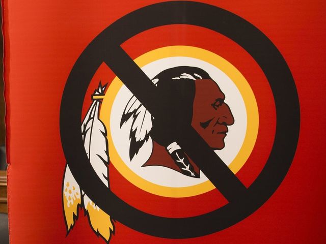 A poster for the 'Change the Mascot' campaign is seen prior to a press conference by the Oneida Indian Nation leaders on Capitol Hill in Washington, DC, September 16, 2014. 'Change the Mascot' is a national campaign to end the use of the racial slur Redskins as the mascot and name of the NFL team in Washington, DC. Launched by the Oneida Indian Nation, the campaign calls upon the NFL and Commissioner Roger Goodell to do the right thing and bring an end the use of the racial epithet. AFP PHOTO / Saul LOEB
