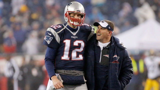 FOXBORO, MA - JANUARY 22: Tom Brady #12 of the New England Patriots talks with offensive coordinator Josh McDaniels prior to the AFC Championship Game against the Pittsburgh Steelers at Gillette Stadium on January 22, 2017 in Foxboro, Massachusetts.