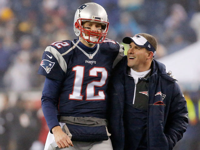 FOXBORO, MA - JANUARY 22: Tom Brady #12 of the New England Patriots talks with offensive coordinator Josh McDaniels prior to the AFC Championship Game against the Pittsburgh Steelers at Gillette Stadium on January 22, 2017 in Foxboro, Massachusetts.
