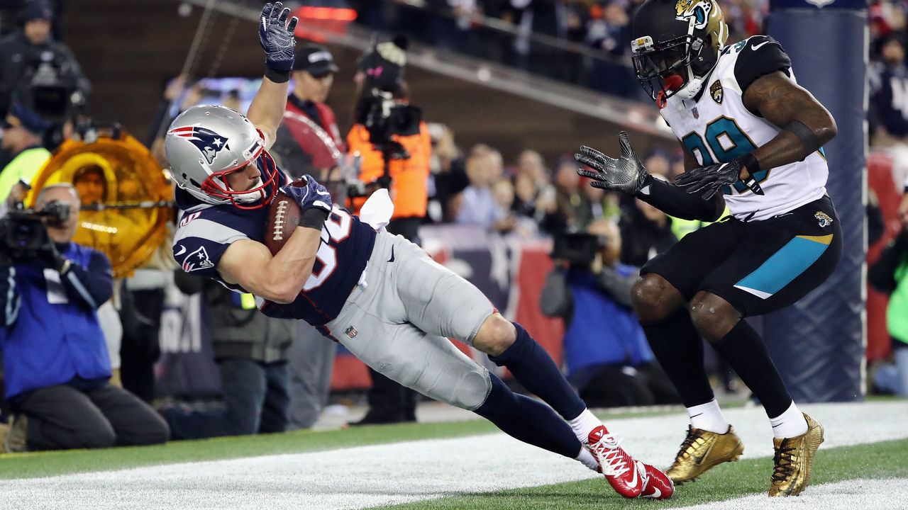 FOXBOROUGH, MA - JANUARY 21: Danny Amendola #80 of the New England Patriots catches a touchdown pass as he is defended by Tashaun Gipson #39 of the Jacksonville Jaguars in the fourth quarter during the AFC Championship Game at Gillette Stadium on January 21, 2018 in Foxborough, Massachusetts.