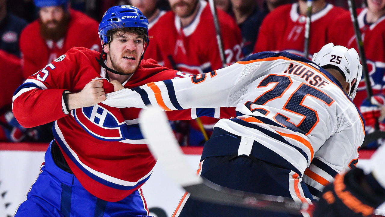 MONTREAL, QC - DECEMBER 09: Andrew Shaw #65 of the Montreal Canadiens fights against Darnell Nurse #25 of the Edmonton Oilers during the NHL game at the Bell Centre on December 9, 2017 in Montreal, Quebec, Canada.