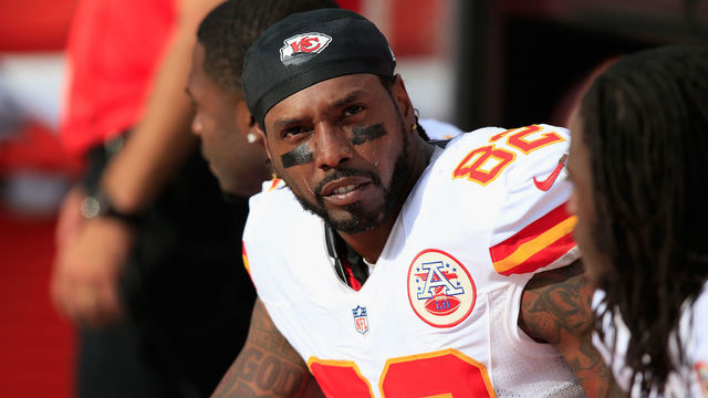 DENVER, CO - SEPTEMBER 14: Wide receiver Dwayne Bowe #82 of the Kansas City Chiefs looks on from the bench against the Denver Broncos at Sports Authority Field at Mile High on September 14, 2014 in Denver, Colorado. The Broncos defeated the Chiefs 24-17.