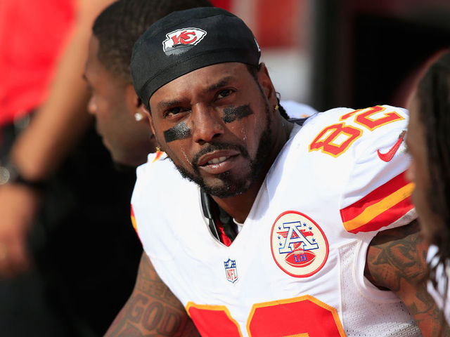 DENVER, CO - SEPTEMBER 14: Wide receiver Dwayne Bowe #82 of the Kansas City Chiefs looks on from the bench against the Denver Broncos at Sports Authority Field at Mile High on September 14, 2014 in Denver, Colorado. The Broncos defeated the Chiefs 24-17.