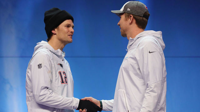 ST PAUL, MN - JANUARY 29: Tom Brady #12 of the New England Patriots and Nick Foles #9 of the Philadelphia Eagles shake hands during Super Bowl Media Day at Xcel Energy Center on January 29, 2018 in St Paul, Minnesota. Super Bowl LII will be played between the New England Patriots and the Philadelphia Eagles on February 4.