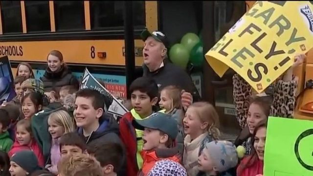 Community raises thousands to send school bus driver to cheer on Eagles at SB