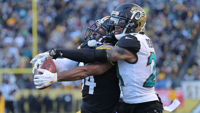 PITTSBURGH, PA - JANUARY 14: Antonio Brown #84 of the Pittsburgh Steelers makes a catch while being defended by A.J. Bouye #21 of the Jacksonville Jaguars for a 43 yard touchdown reception in the fourth quarter AFC Divisional Playoff game at Heinz Field on January 14, 2018 in Pittsburgh, Pennsylvania.