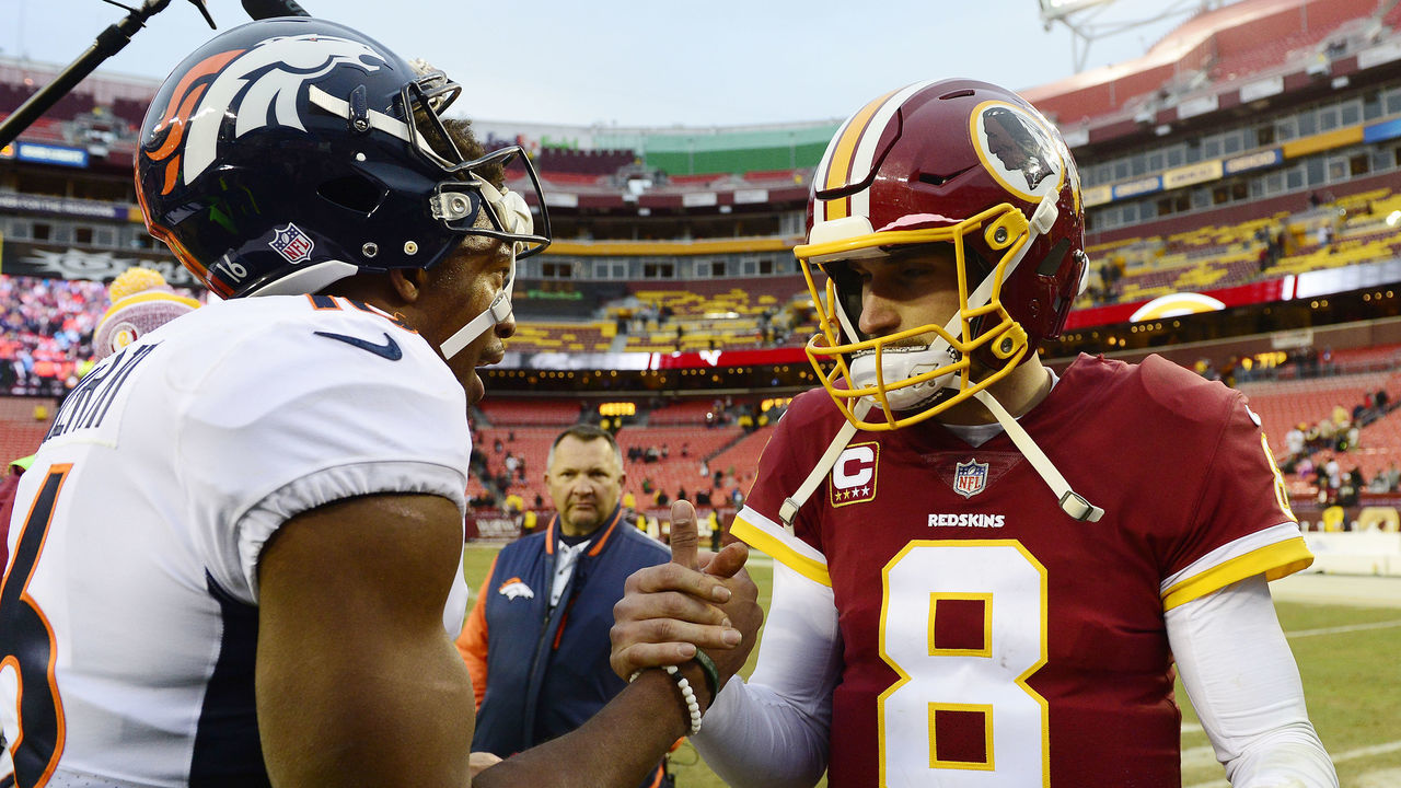 LANDOVER, MD - DECEMBER 24: Quarterback Kirk Cousins #8 of the Washington Redskins and wide receiver Bennie Fowler #16 of the Denver Broncos shake hands after the Redskins defeated the Broncos 27-11 at FedExField on December 24, 2017 in Landover, Maryland.