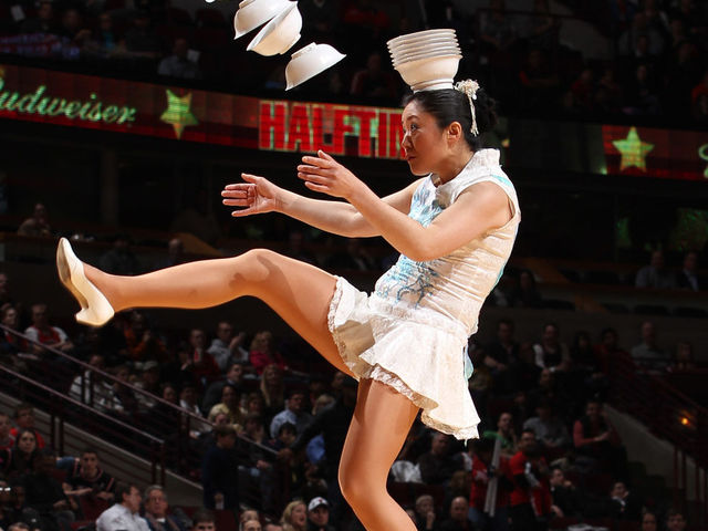 CHICAGO, IL - MARCH 21: A member of the Red Panda Acrobats performs during halftime of the game between the Chicago Bulls and the Portland Trail Blazers on March 21, 2013 at the United Center in Chicago, Illinois. NOTE TO USER: User expressly acknowledges and agrees that, by downloading and/or using this photograph, user is consenting to the terms and conditions of the Getty Images License Agreement. Mandatory Copyright Notice: Copyright 2013 NBAE