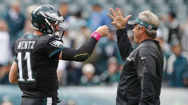 PHILADELPHIA, PA - OCTOBER 23: Carson Wentz #11 and Head coach Doug Pederson fist bump during warmups before taking on the Minnesota Vikings at Lincoln Financial Field on October 23, 2016 in Philadelphia, Pennsylvania.