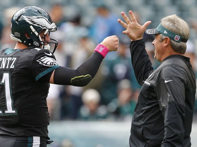 PHILADELPHIA, PA - OCTOBER 23: Carson Wentz #11 and Head coach Doug Pederson fist bump during warmups before taking on the Minnesota Vikings at Lincoln Financial Field on October 23, 2016 in Philadelphia, Pennsylvania.